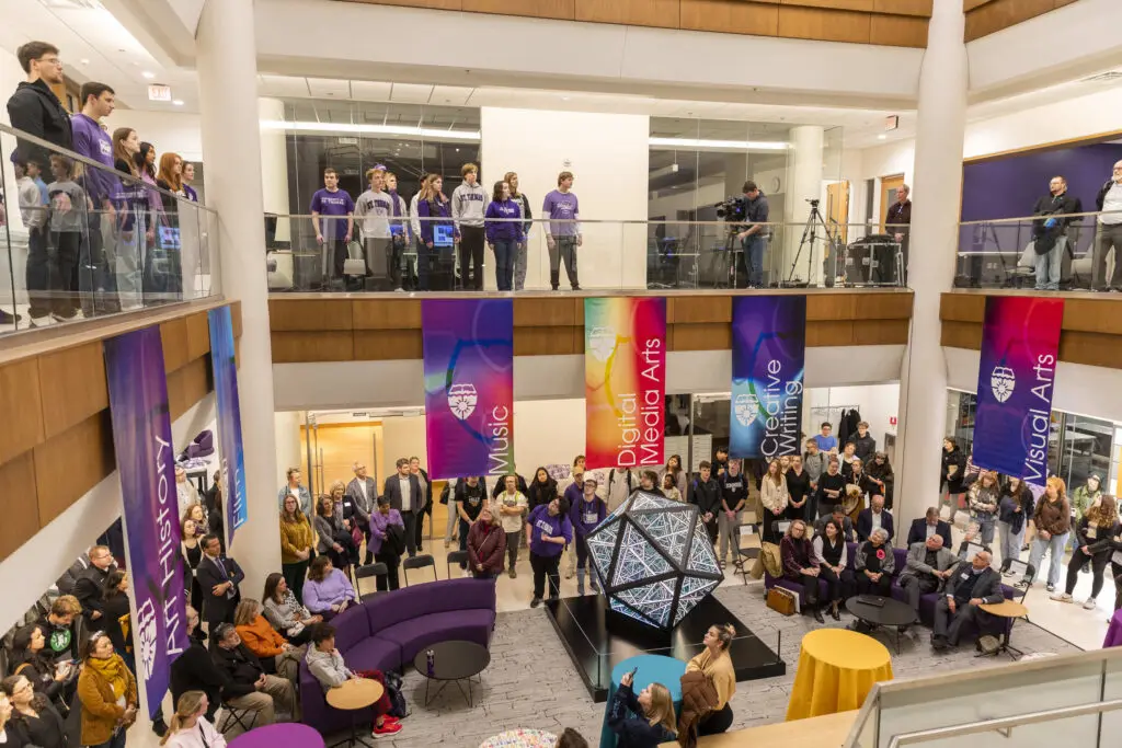 Arts education gift announcement made from John P. Monahan in the Schoenecker Center atrium on November 14, 2024, in St. Paul.