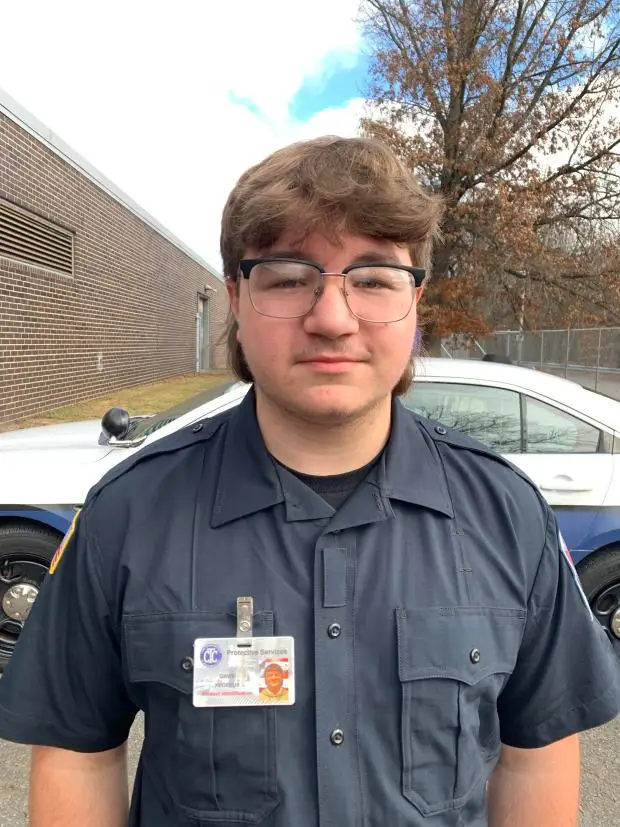 Scranton donated a 2015 Ford Taurus Interceptor police car to the Career Technology Center of Lackawanna County for education in the high school's Protective Services Program. The city delivered the vehicle to the school in Scranton on Friday, Nov. 15, 2014. Gavin Hegedus, a student in the Protective Services Program, was one of several students who attended the event. JIM LOCKWOOD / STAFF PHOTO