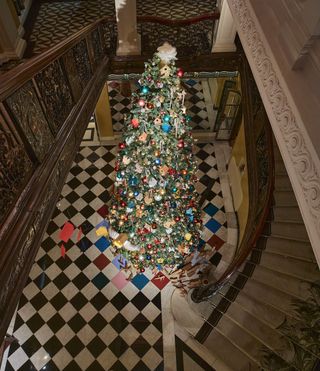 Paul Smith’s Claridge’s Christmas tree is a playful slice of ‘countryside in the centre of London’