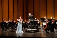 Violinist Jaewon Wee performs with the Dallas Chamber Symphony, led by music director...