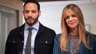 Kaitlin Olson and Daniel Sunjata smiling in High Potential.