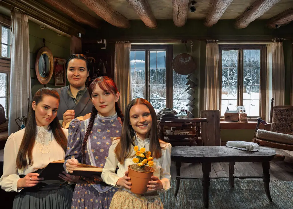 Four actresses from Firehouse Theater company dressed in 19th century clothes