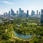 Aerial view of a park and Houston's skyline.