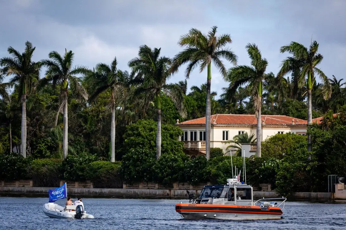 A boat holding a campaign flag is seen near Mar-a-Lago, the residence of US President-elect Donald Trump on November 8 in Palm Beach, Florida.