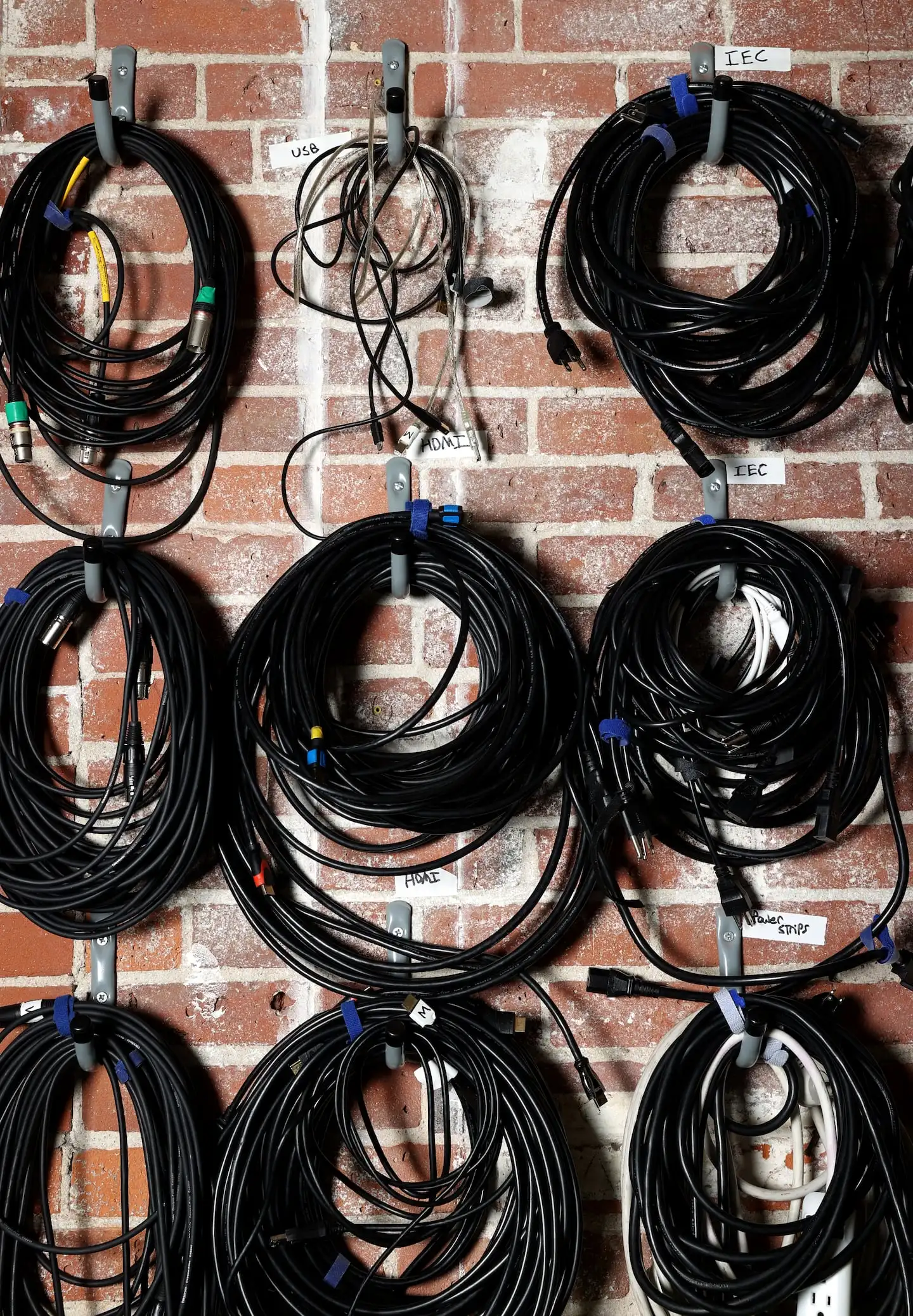 Cables on a wall in MASARY Studios' fabrication space. 