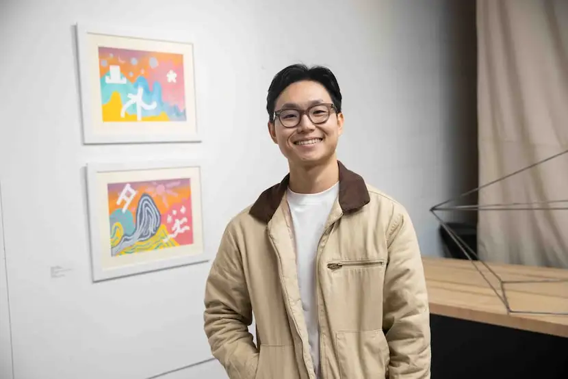 Jae Hyun Choi poses in front of his piece “Immanence,” 2024, Acrylic, pastel chalk on canvas...