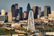 Aerial view of the Margaret Hunt Hill Bridge looking toward the downtown skyline from West...