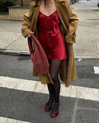 Influencer Wearing Red Slip Dress and Black Tights