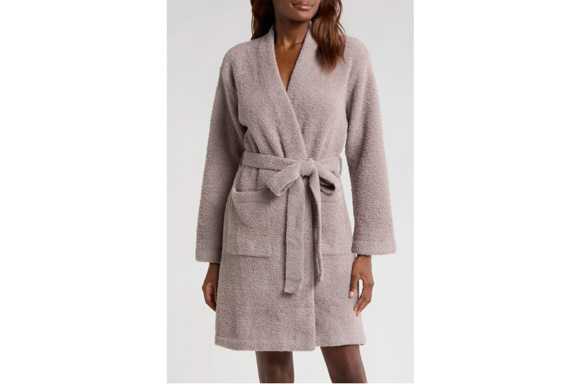 A model in a plush robe