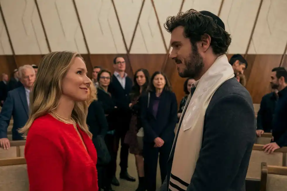 ceremony with a couple standing close to each other surrounded by attendees