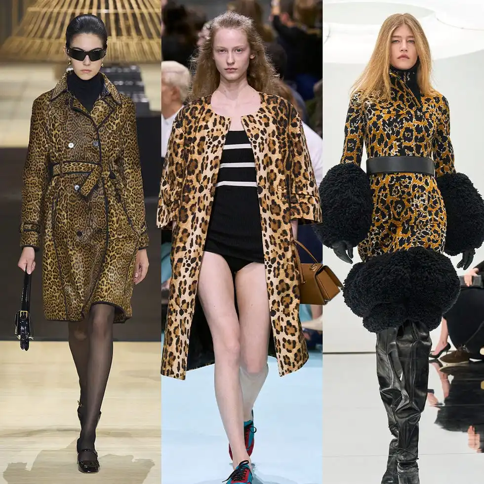 three models wearing leopard print outfits on a runway