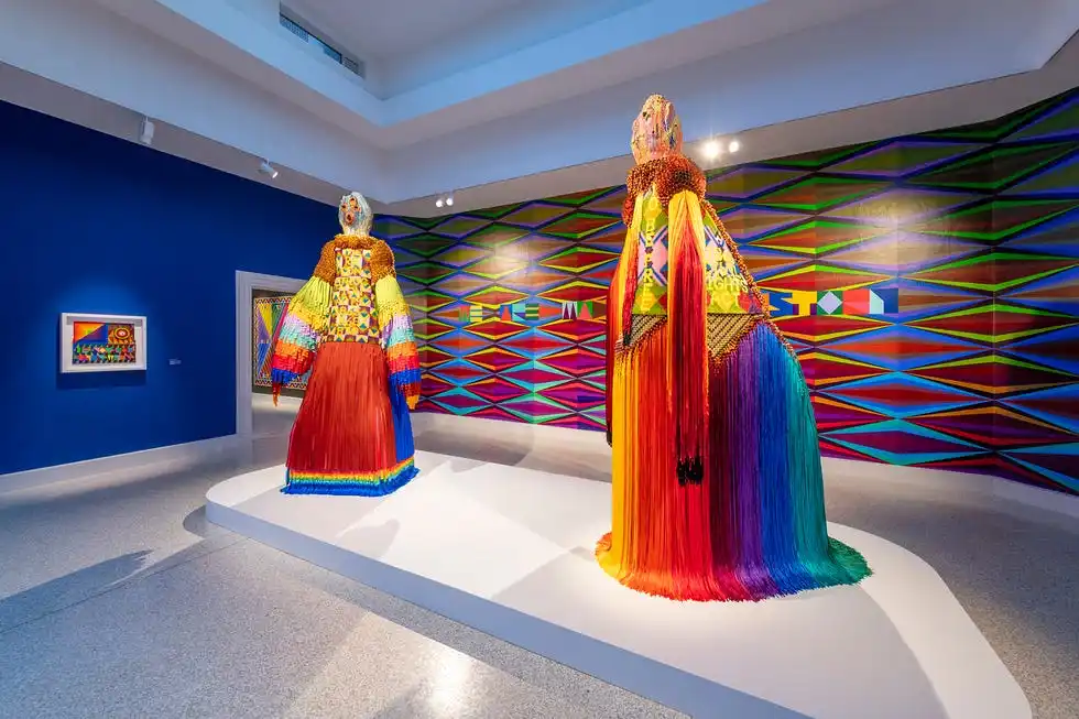 colorful garments displayed in a modern art exhibition