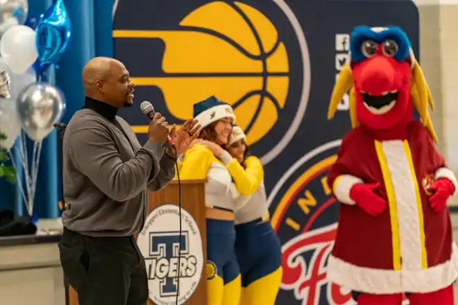 Evansville Police Chief Phil Smith addresses the crowd during the Pacers Sports & Entertainment 15th annual Big Toy Giveaway at Tekoppel Elementary School in Evansville, Ind., Thursday, Dec. 5, 2024.