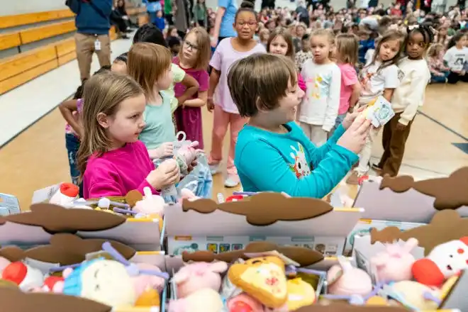 Kids pick out a toy during the Pacers Sports & Entertainment 15th annual Big Toy Giveaway at Tekoppel Elementary School in Evansville, Ind., Thursday, Dec. 5, 2024.