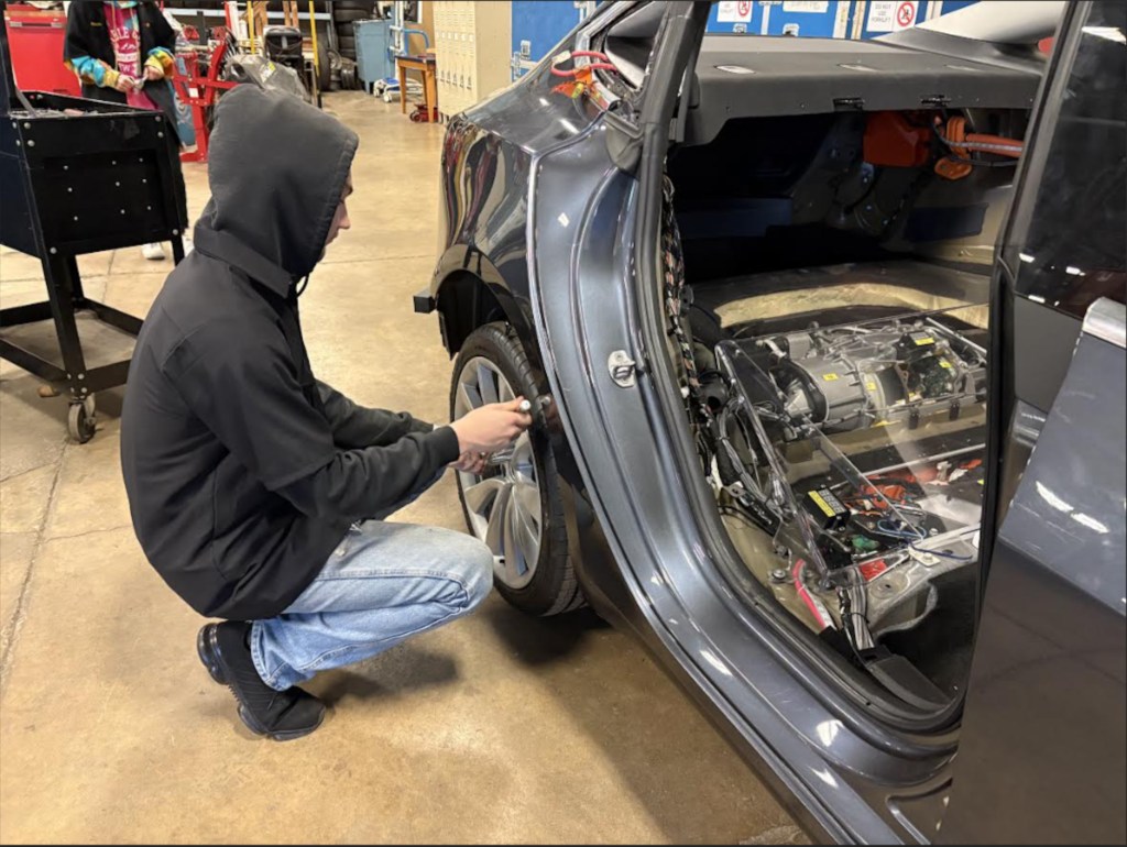 SNAPSHOT: Questar III BOCES automotive students get opportunity to work on a Tesla