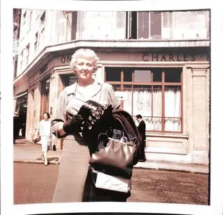 A polaroid of a woman in the 1950s