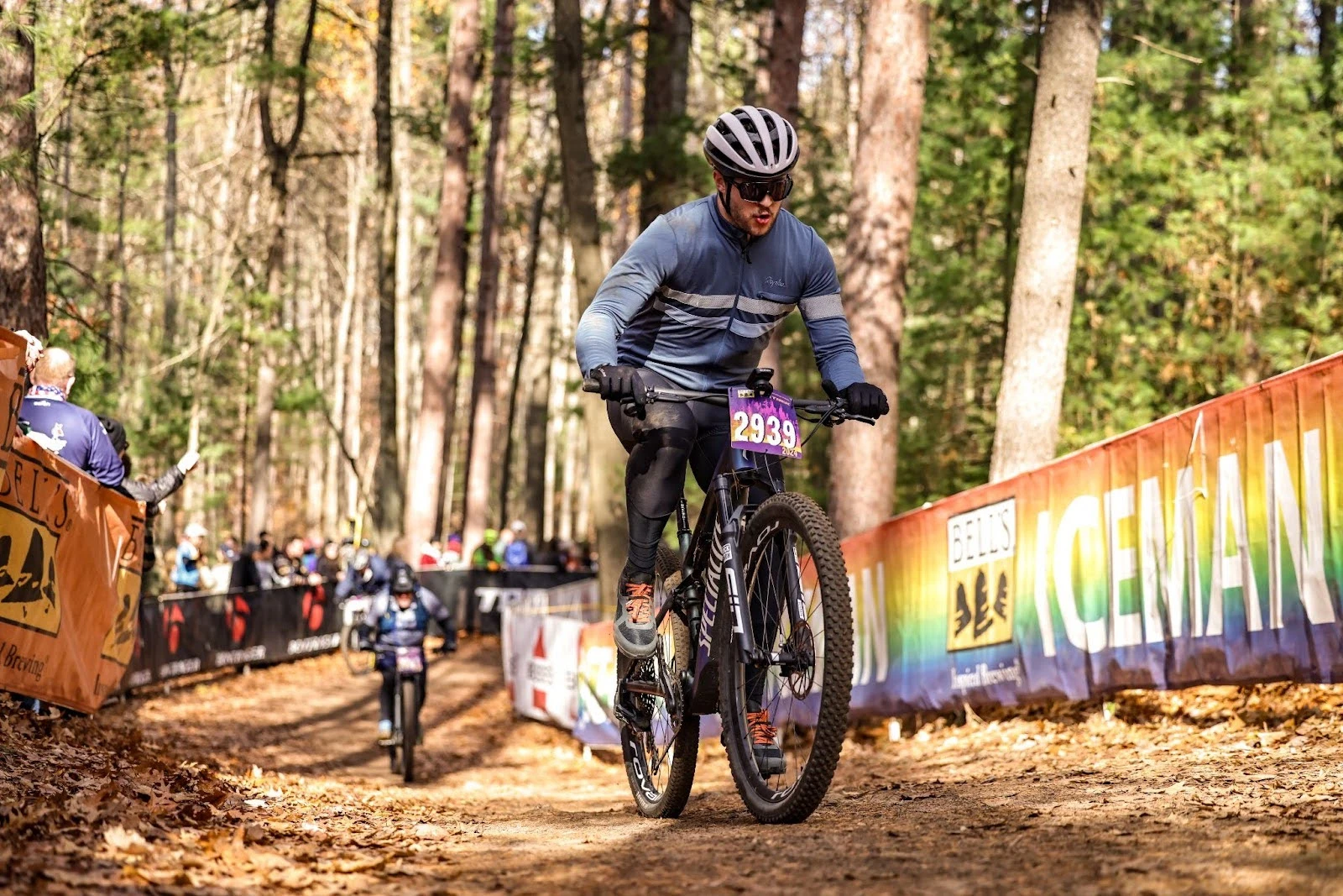 man riding Specialized Epic 8 Pro on a race day