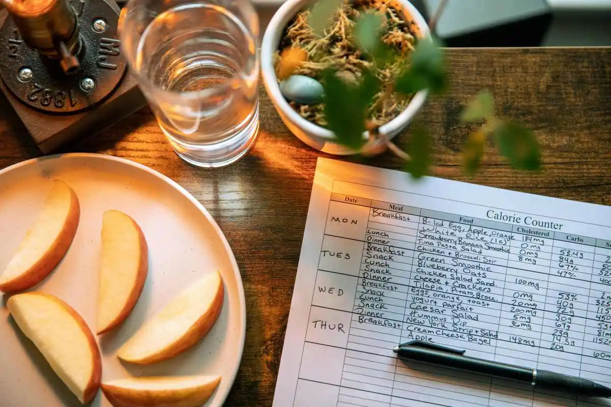 A person journaling their diet details. (Representative Image Source: Pexels | Spencer Stone)