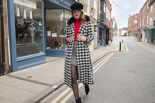 Joe Browns staged an AW24 fashion shoot in York city centre (the coat is £130).