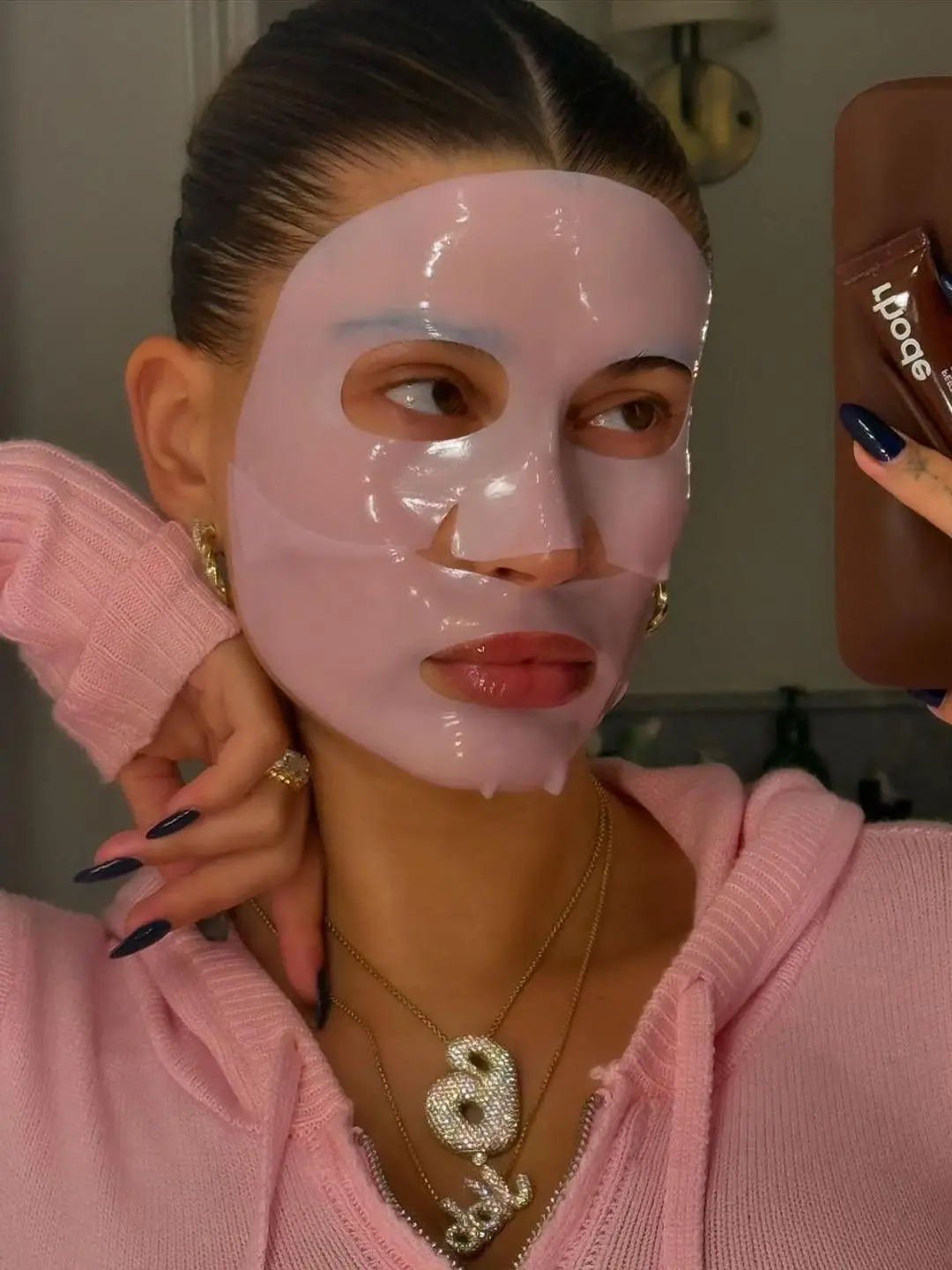 hailey bieber pink face mask