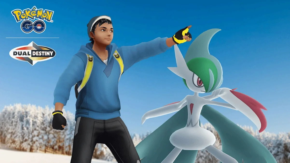 Text in the top left corners reads Pokémon GO Dual Destiny. A Mega Gallade and a Pokémon GO trainer are shown pointing off to the right side of the image as is preparing for battle, with a blue sky and snow covered trees out of focus in the background.