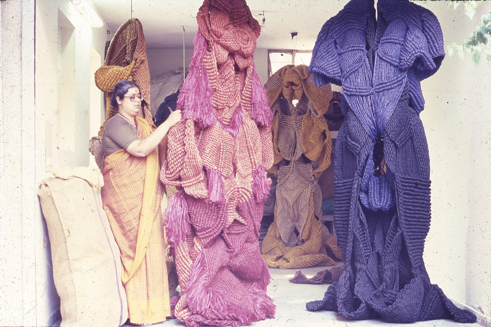 Mrinalini Mukherjee and works in progress at her garage studio, 1985, which features in the exhibition A Story of South Asian Art: Mrinalini Mukherjee and Her Circle.