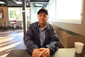 Northborough resident Frank Brown at Dunkin’, where he visits every morning. (Photo/Evan Walsh)