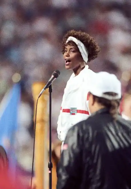 Whitney Houston performs the National Anthem prior to the start of Super Bowl XXV between the New York Giants and the Buffalo Bills at Tampa Stadium.