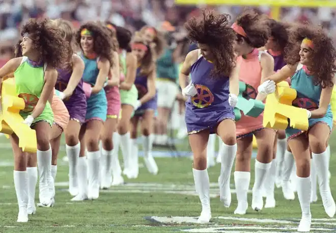 Pregame performers on the field prior to the start of Super Bowl XXV between the New York Giants and the Buffalo Bills at Tampa Stadium