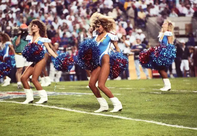 Cheerleaders perform on the field prior to the start of Super Bowl XXV between the New York Giants and the Buffalo Bills at Tampa Stadium.