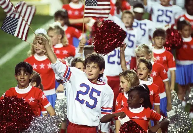 Local youth perform in the halftime show during Super Bowl XXV between the New York Giants and the Buffalo Bills at Tampa Stadium.