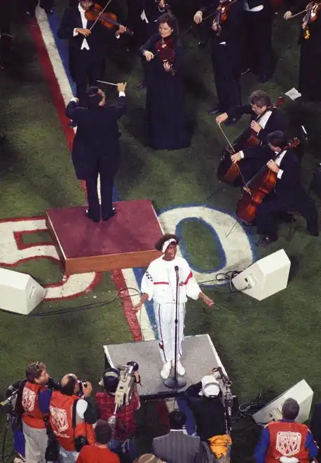 Whitney Houston performs the National Anthem prior to the start of Super Bowl XXV between the New York Giants and the Buffalo Bills at Tampa Stadium.