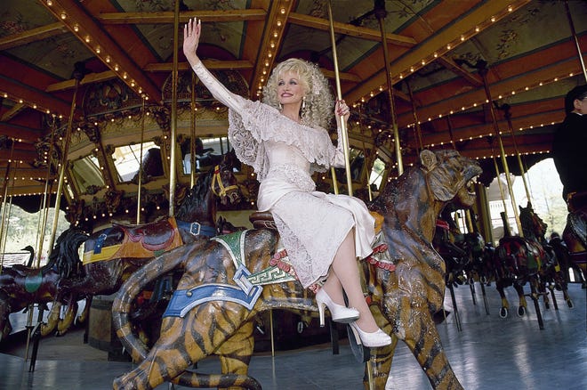 See some of Dolly Parton’s best outfits through the years