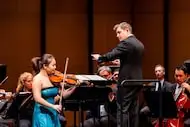 Violinist Sarah Ying Ma performs with music director Richard McKay and the Dallas Chamber...