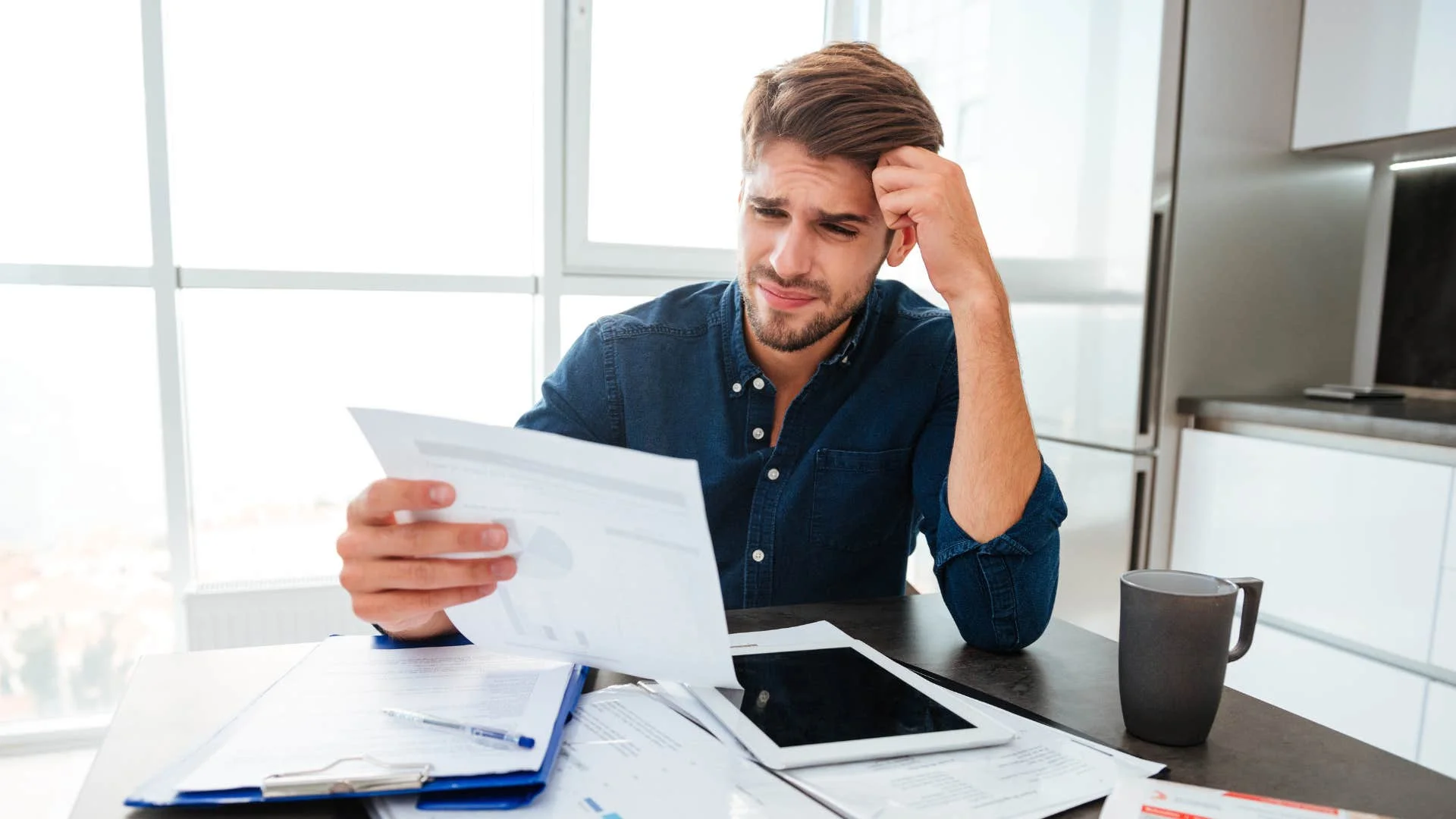 Young man struggling with money issues