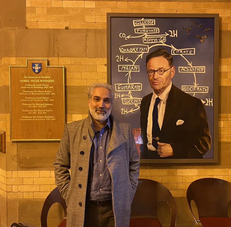 Zeid Al-Bayaty standing in front of Kreb's Cafe at the University of Sheffield