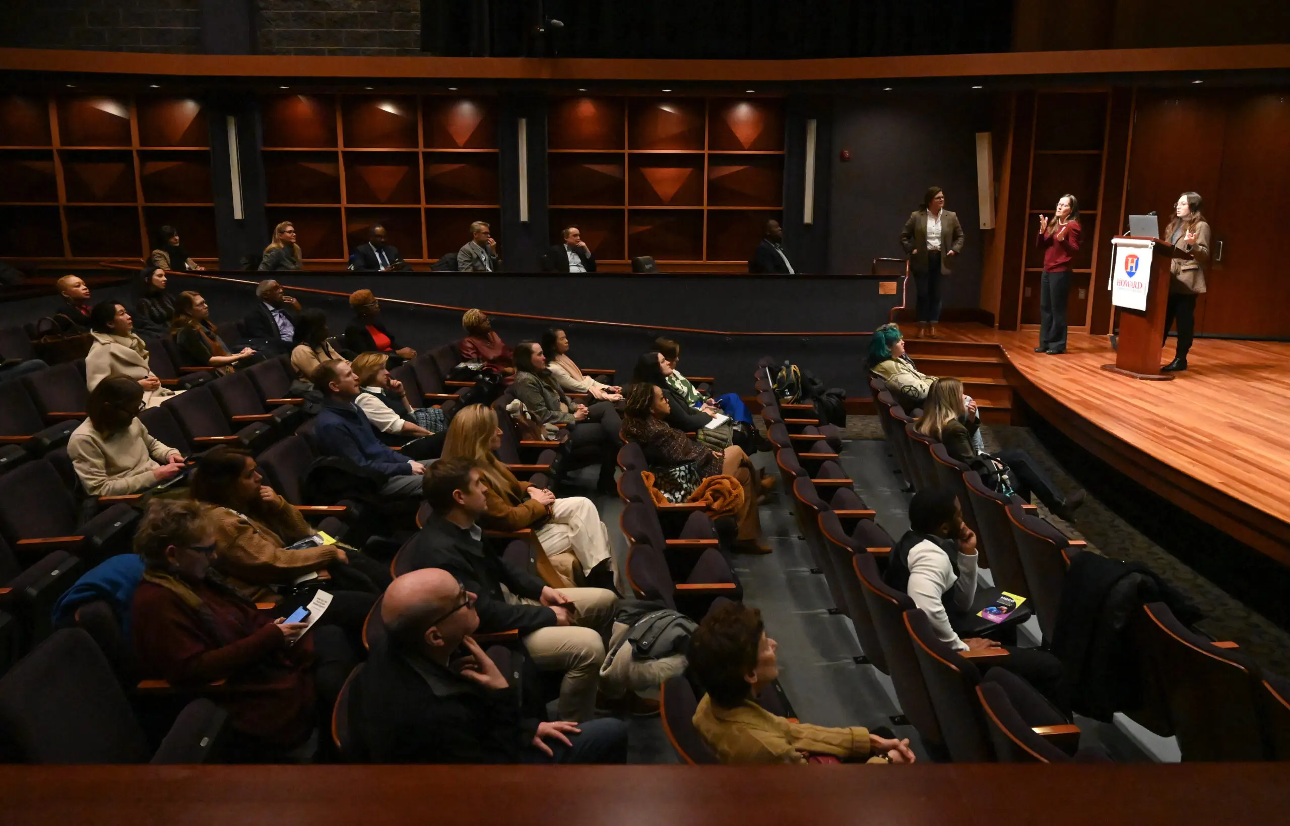 Jasmine Metcalf, an urban planner with Designing Local, speaks at the podium during the announcement of the Howard County Arts and Culture Plan, held at Howard Community College's Horowitz Center on Thursday. (Brian Krista/Staff)