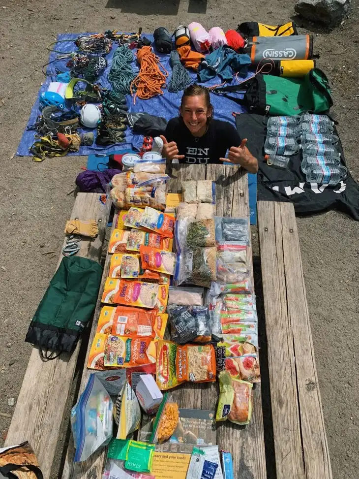 A woman with a table full of food