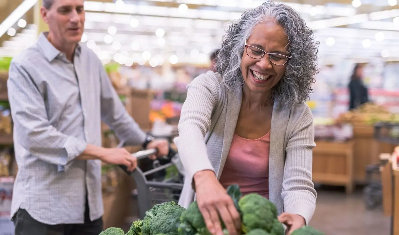 older woman grocery shopping