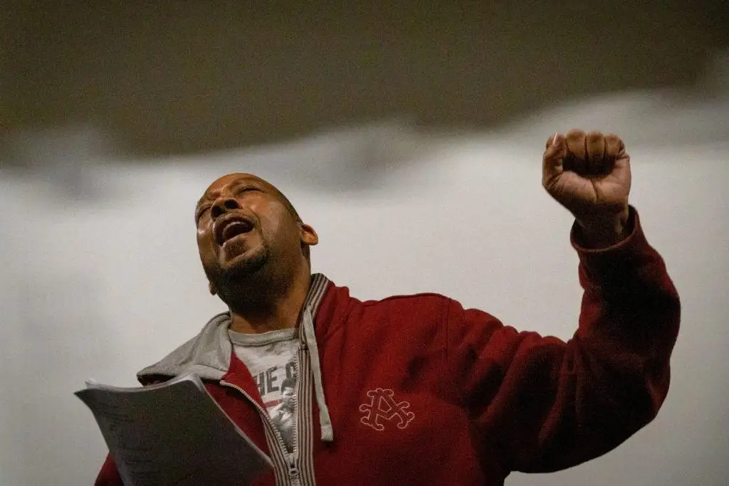 Vocalist Tony Howard belts a note during a rehearsal at Su Teatro Cultural and Performing Arts