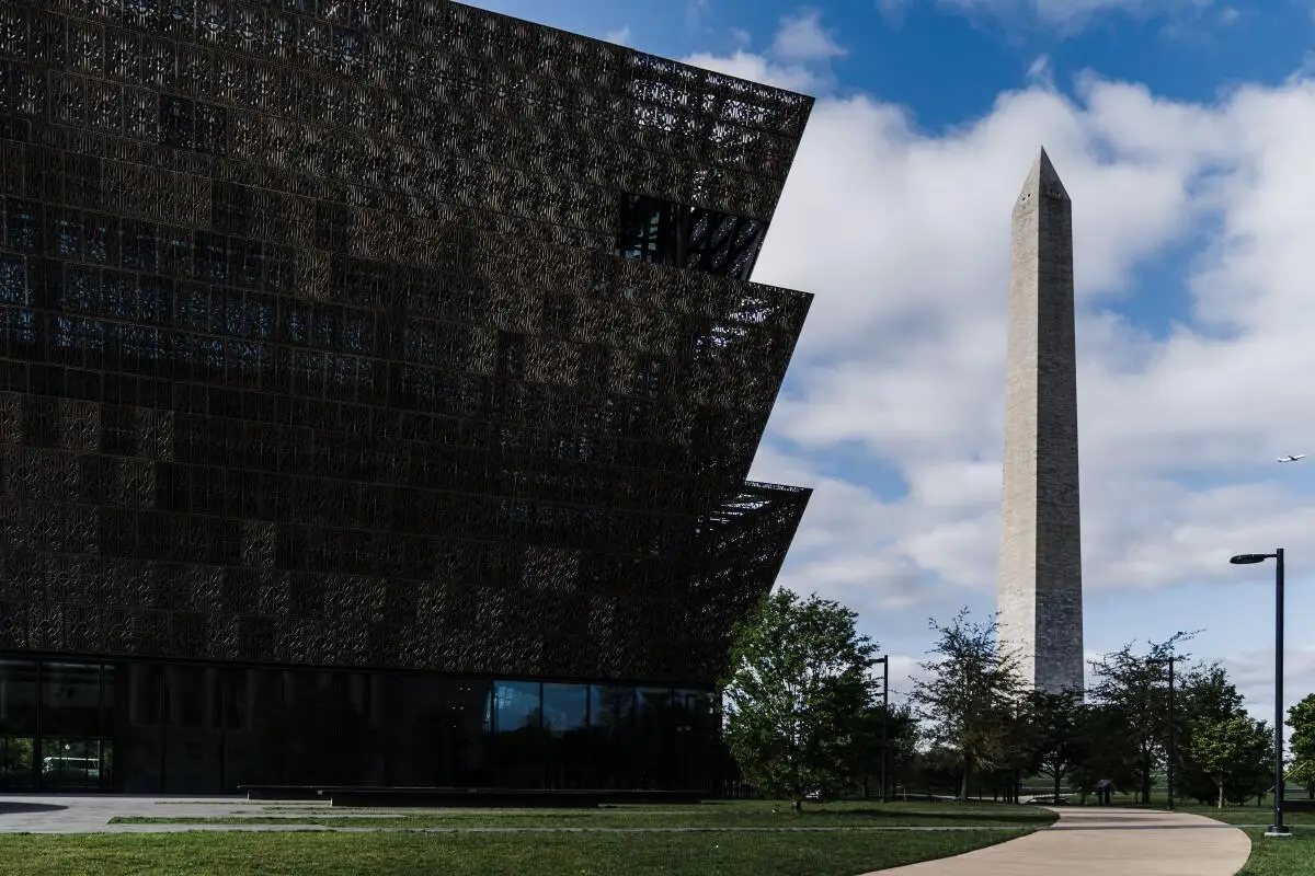 The Smithsonian National Museum of African American History and Culture, with the Washington Monument nearby.