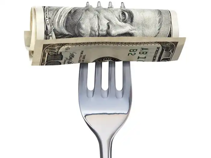 Fork through $100 bill.