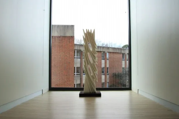 A marble statue, created by Uruguayan sculptor Pablo Atchugarry, is placed in Gallery 8's floor to ceiling window at the Muscarelle Museum of Art's new expansion center. James W. Robinson/staff.