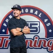 an image of Mark Walhberg in front of the F45 logo