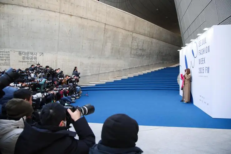 Reporters take photos of celebrities on a media wall during SFW on Wednesday. Courtesy of SFW