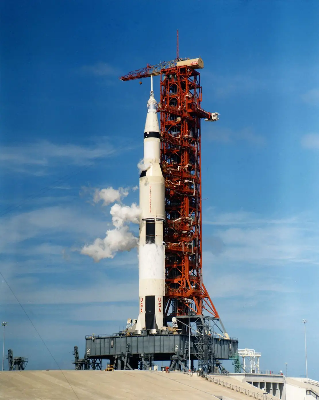 The Apollo 12 Saturn V rocket vents a cloud of liquid oxygen, a type of propellant, on November 3, 1969, during a countdown demonstration test on the launchpad.