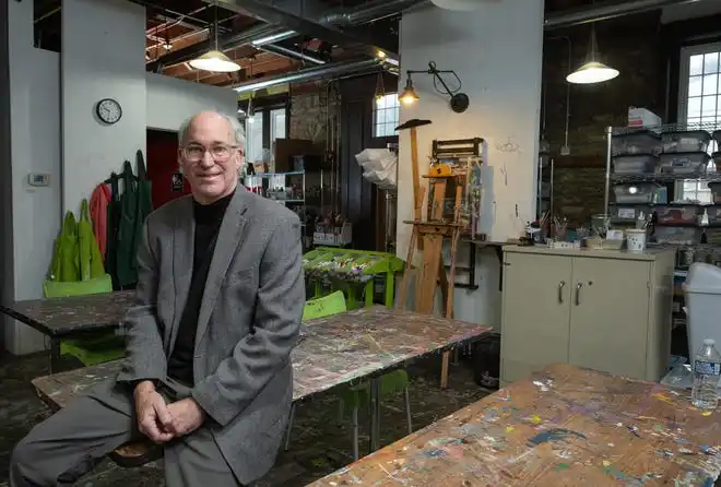 Artist Paul Hamilton in his art studio and classroom at Bryn Du Mansion.