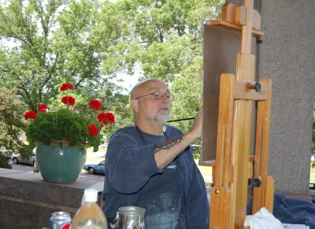 Artist William Murray works on a painting in summer 2011 during a public demo at Groveland Gallery in Minneapolis. (Photo courtesy Groveland Gallery)