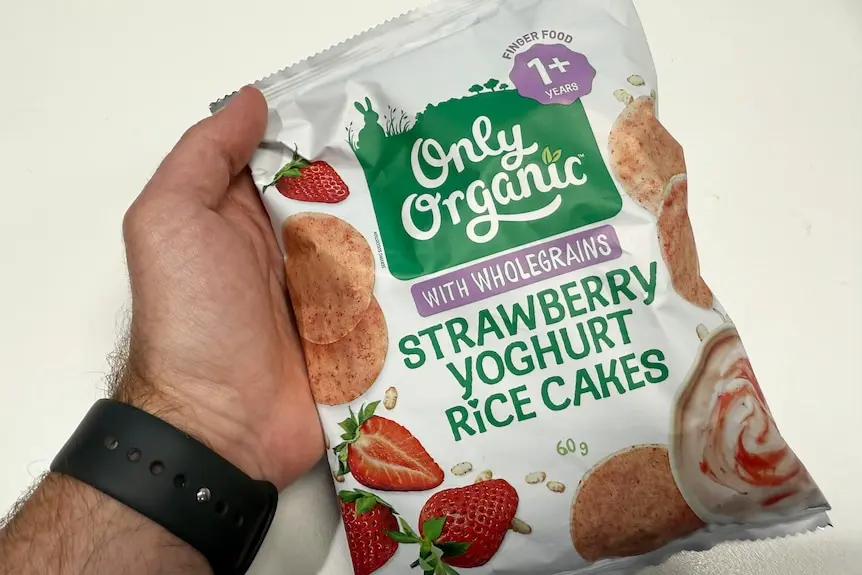 A packet of food with the words 'Strawberry Yoghurt Rice Cakes' printed on it.