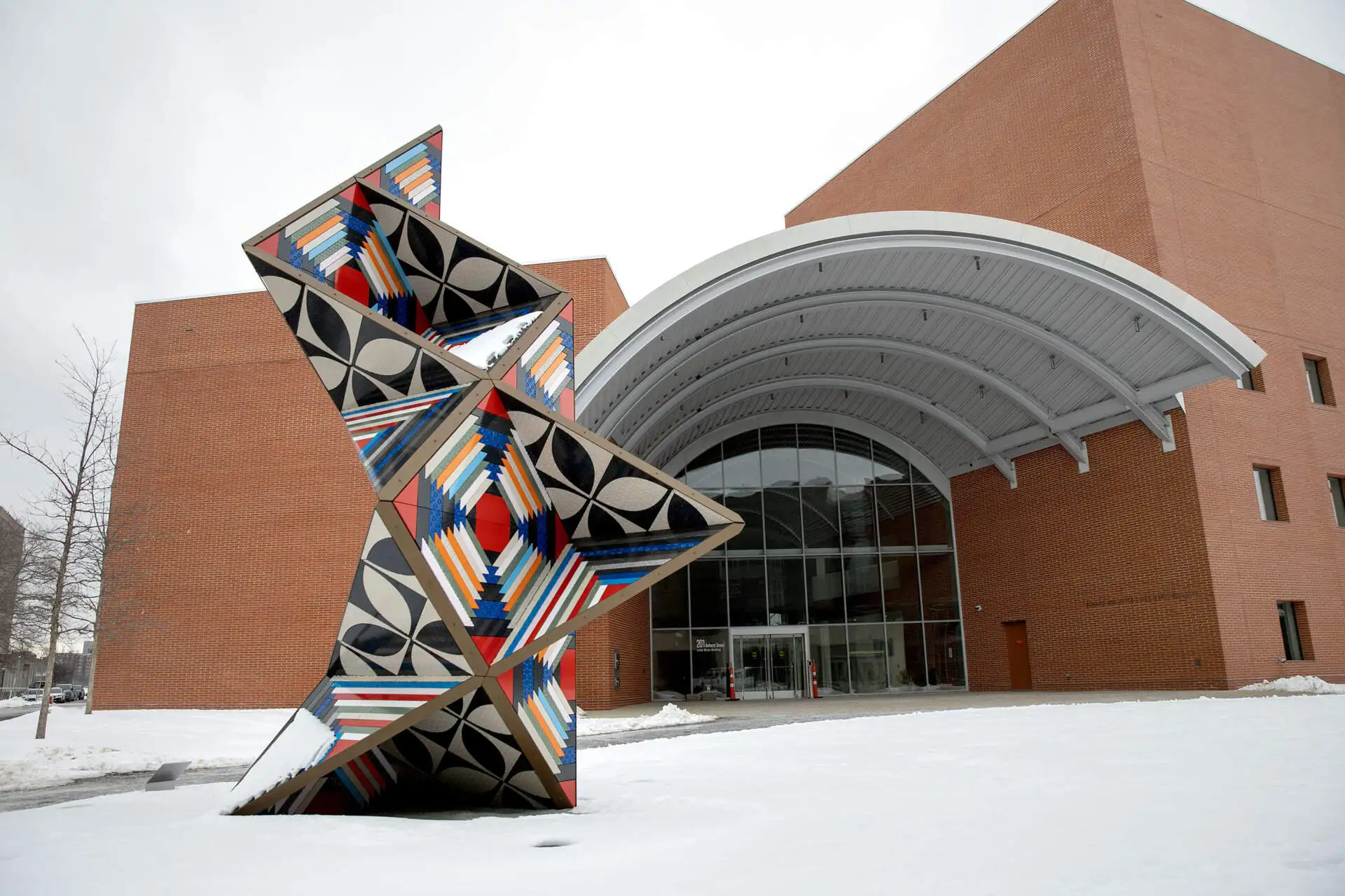 Artist Sanford Biggers' "Madrigal" sculpture stands in front of MIT's Edward and Joyce Linde Music Building, in Cambridge, Mass. (Robin Lubbock/WBUR)